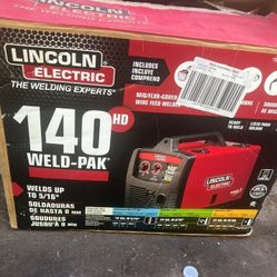 Lincoin  Electric  140 Amp Weld Pak 140 HD MIG Wire Feed Welder  With Magnum 100L Gun, Sample spools of MIG Wire  and  Flux Wire,  115V  