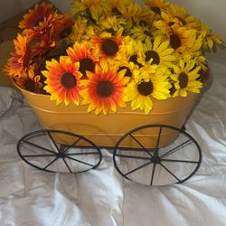 House Decoration Flowers In A Big Carriage 