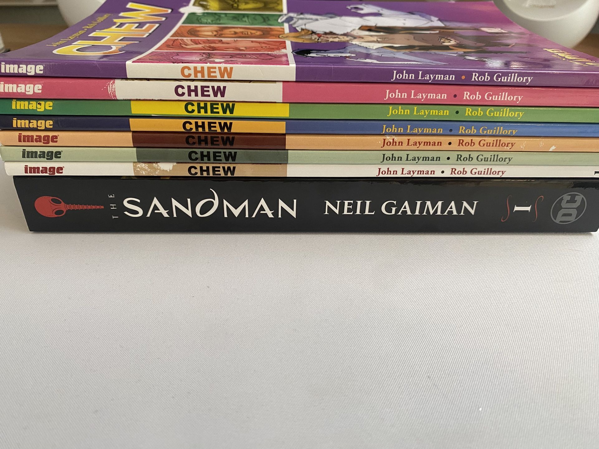 Chew Trade Paperbacks Volumes 1-7 and The Sandman Book 1