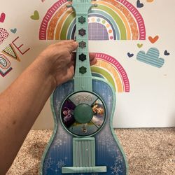 DISNEY GUITAR - FROZEN, PLAYS 3 SONGS AND LIGHTS UP IN COLORS!  LIKE NEW