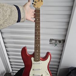 Electronic Guitar And An Amp