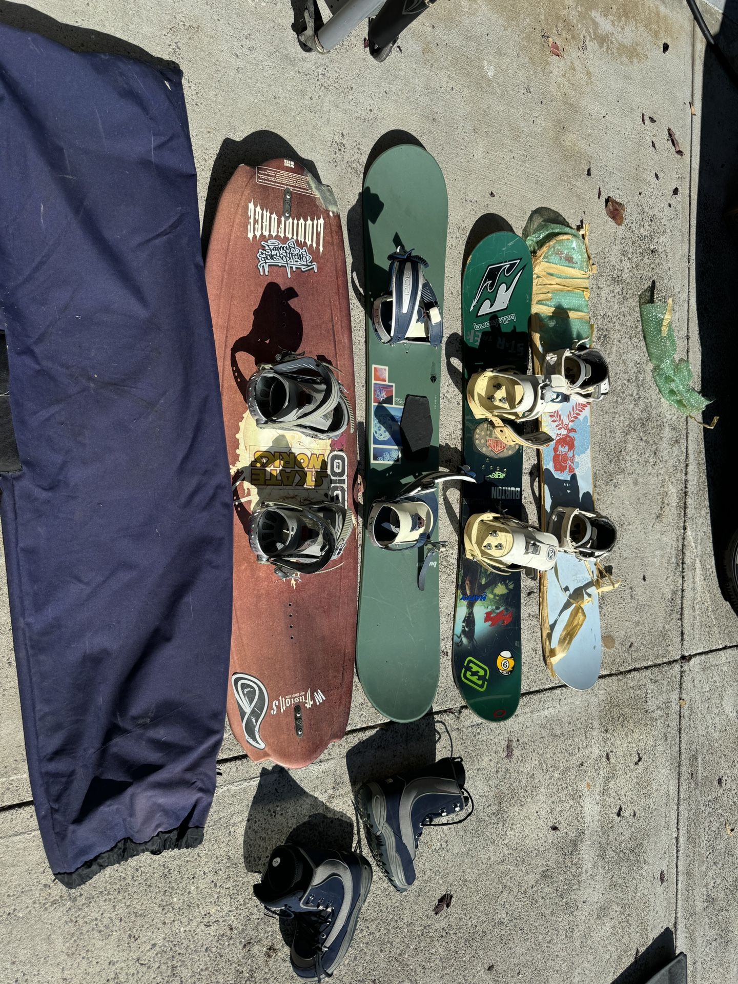 3 burton snowboards with bindings, 1 snowboard bag, wakeboard with bindings. Buyer to take all items.