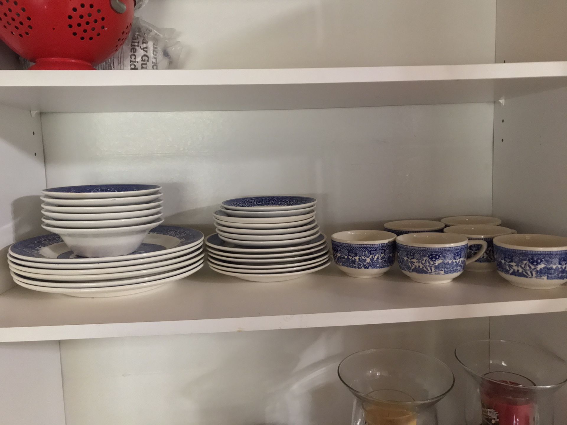 Set of royal blue tea cups and plates