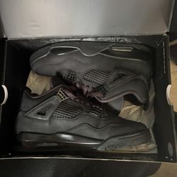 Black Cat Jordan 4s