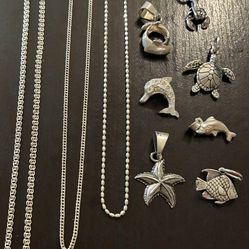 Lot of 3 chains and 7  pendants