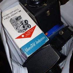 A bag full of vintage cameras