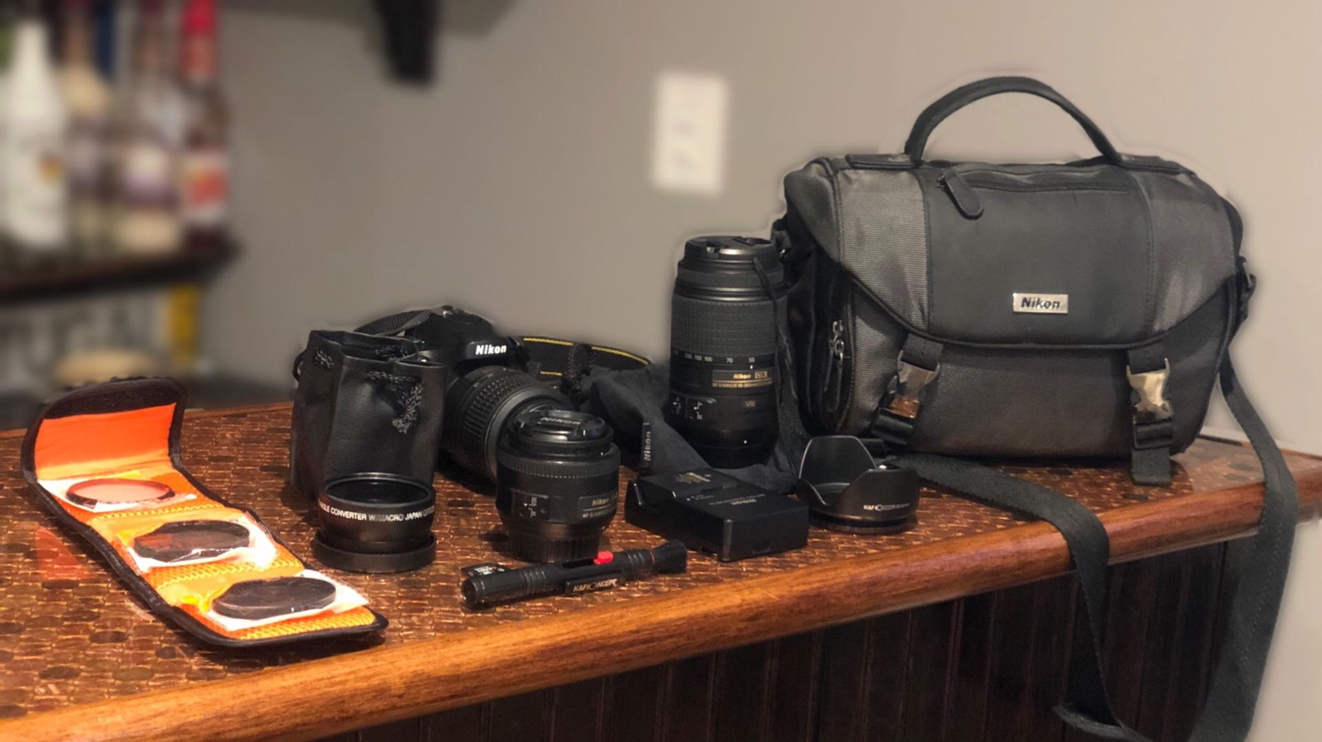 Nikon D5100 with 35mm, 18-55mm, and 55-300mm