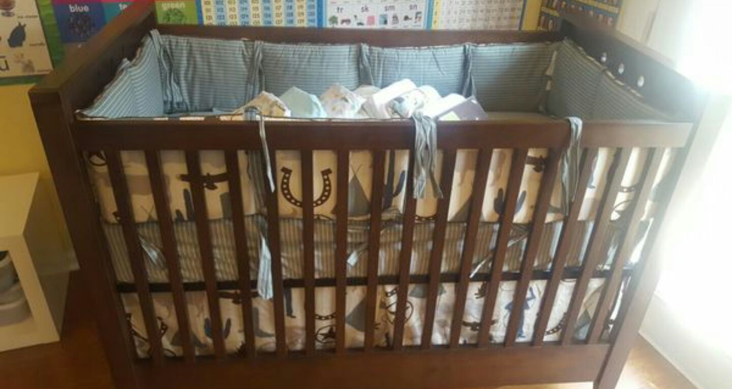 Amy Coe designer Stamford Baby Crib and Dwell Studio bedding set.