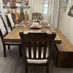 Dining Table, Bench And 4 Chairs For $700