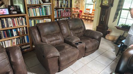 Brown love seat couch