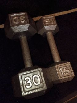 30 pound and 15 pound dumbbells