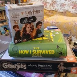 3  GAMES: HARRY POTTER, HOW I SURVIVED, GEARJITS MOVIE PROJECTOR - $25 (Washington Park, i25 and Alameda, Denver)