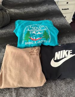 Women’s size large hoodies and sweat shirt. All for $6
