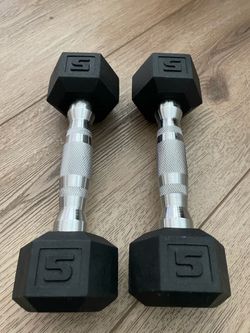 A pair of 5 lbs dumbbells