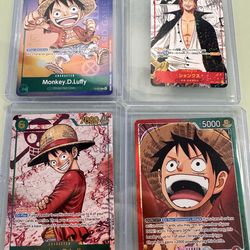 One piece lot of luffy and mini shanks 4 cards no trades pls don’t ask
