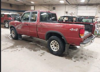 Red 4x4 Extended Cab Pickup Truck Mazda