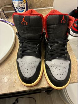 Nike Air Jordan 1 Mid sneakers in the "Bred Shadow" colorway