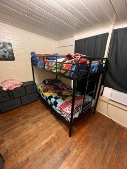 All black steel bunk beds