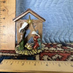 Baby Jesus With Joseph & Mary In Manger