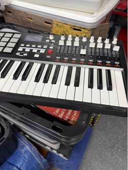 MIDI Keyboard Controller with Faders and Pads