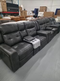 Dark Leather Reclining Loveseats with Console
