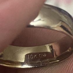 Men's wedding ring in 10 karat white gold, I ask for $340 the price is firm.