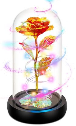 Artificial gold and red foil rose enclosed in a clear glass dome on a black base with colorful LED string lights wrapped around the stem.  New 3AAA Ba