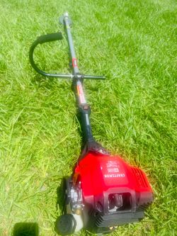 Powerful Craftsman WS 4200 string trimmer. Has a red engines and gray shaft. Comes with a curved handle. String head has line. He doesn't want to turn