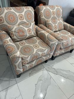 2 Accent chairs with matching pillows