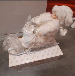 Christmas china doll in a sleigh white collector porcelain