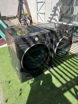 LG ThinQ Front-Load Washer and Dryer Set (used for 2 months)