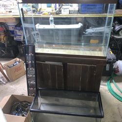 2 Fish Tanks And  A Few Lights And A Thermometer Thing
