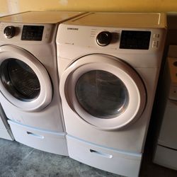 Samsung Front Load Washer And Stackable Gas Dryer Set With Pedestals 
