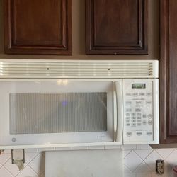 GE SpaceMaker Microwave (above range)