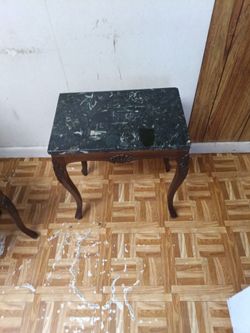 Dark green marble side table.