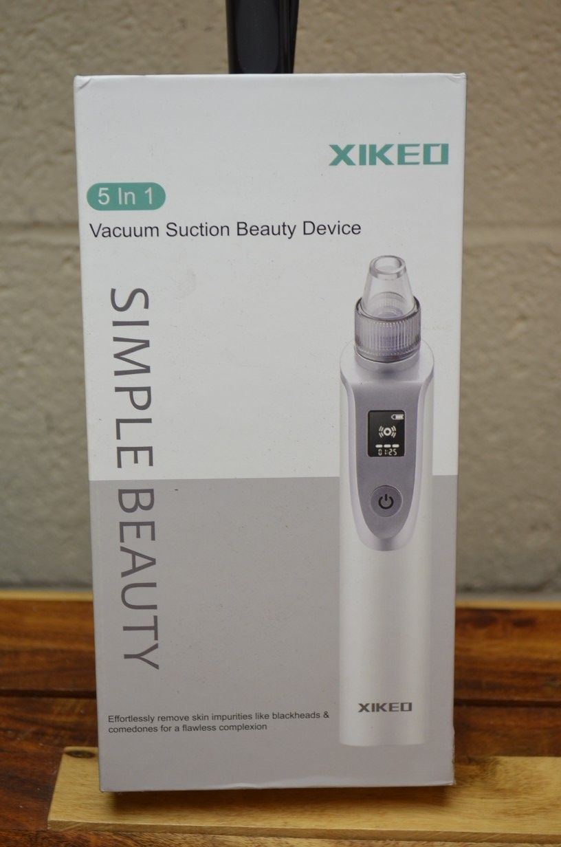 Xikeo blackhead remover vacuum suction cleaner facial beauty device
