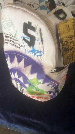 Sprayground Shark Money Bag Backpack – White/Purple Graphic Design