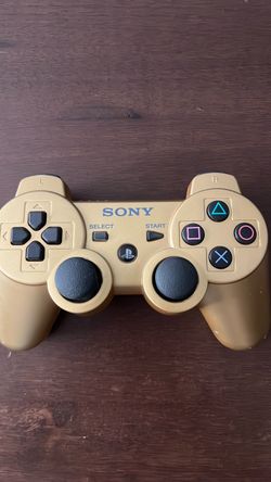 PlayStation 3 gold controller.