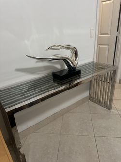 Soho. Mesa consola acero inoxidable pulido y cristal templado