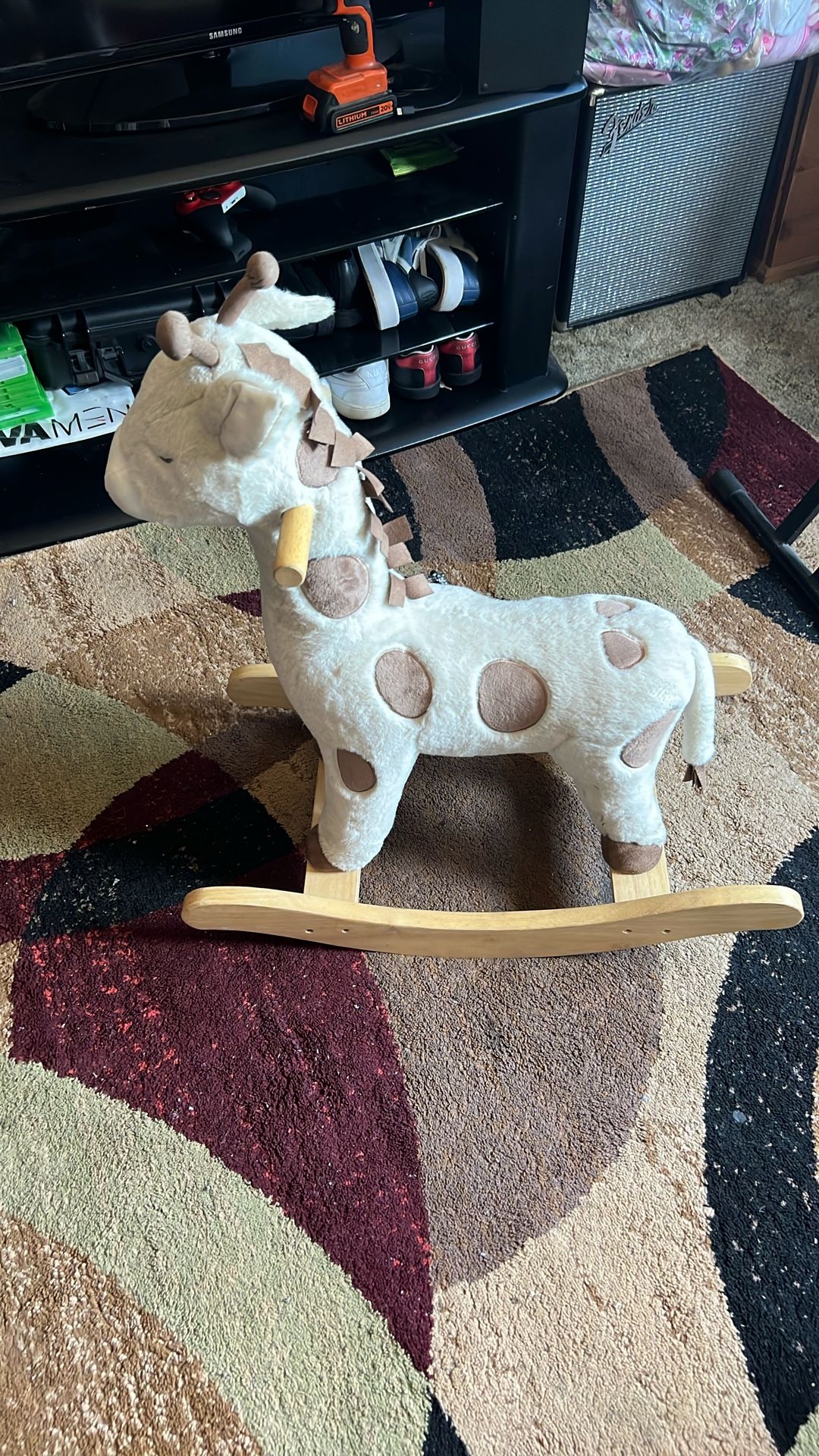 Giraffe Plush Nursery Rocker, commonly found at retailers like Pottery Barn Kids