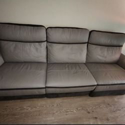 Leather Sofa With Some Fabric Inserts 
