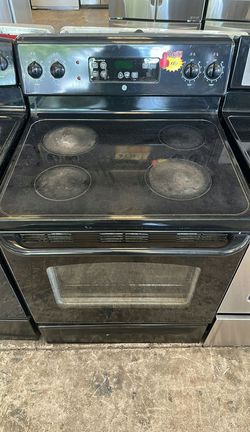 Black GE Electric Range with Glass Top
