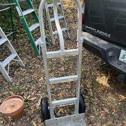 Super aluminum Dolley Handtruck $165  red Milwaukee $60, light 300 lb Dolley $35 conversion to cart $35 new port Richey