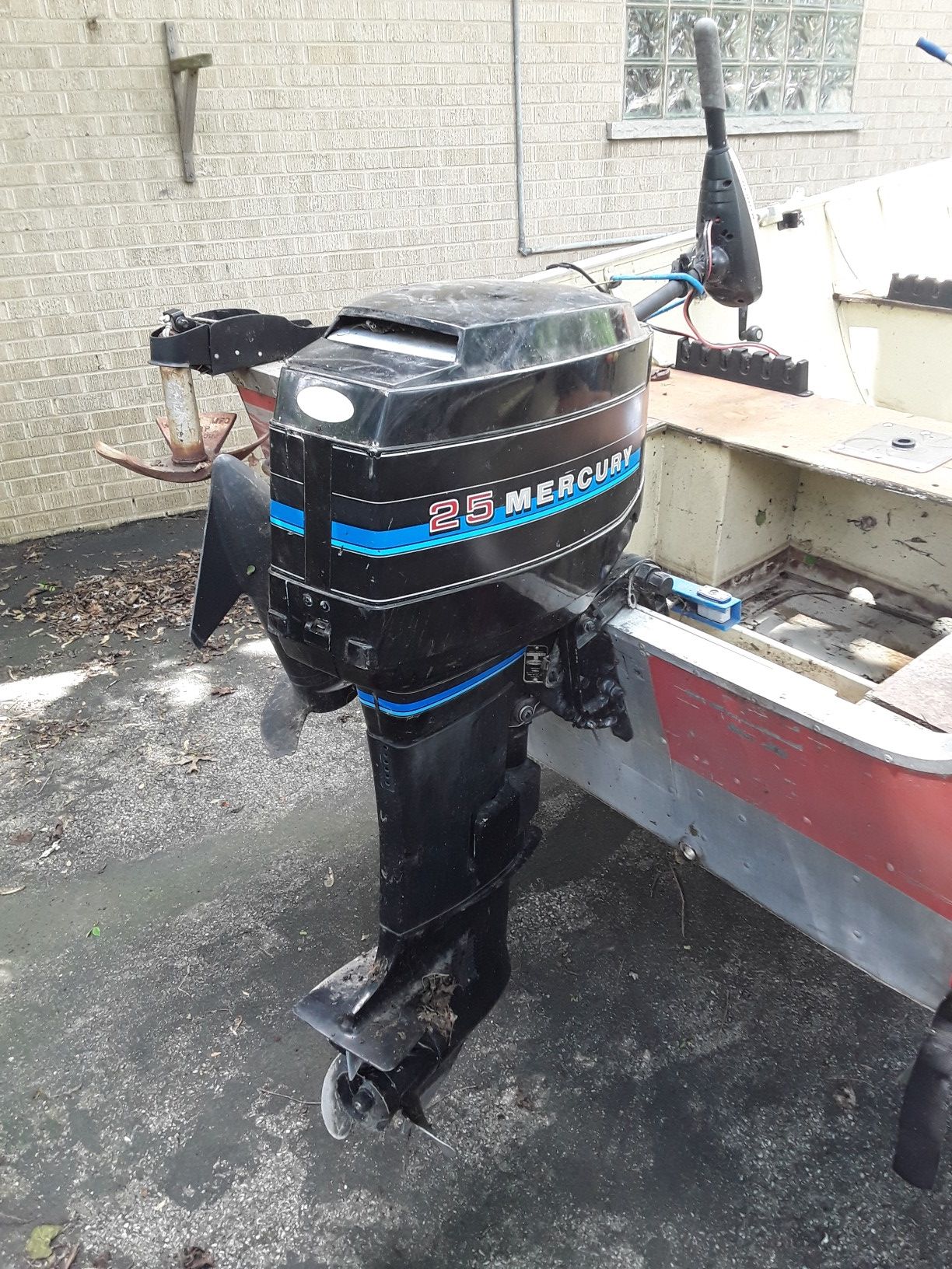 16 foot Lund fishing boat with a 25 horse Mercury motor plus of a