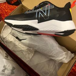 New Balance  Under Armpit