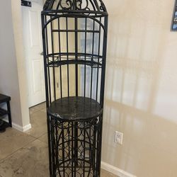 Metal birdcage wine rack
