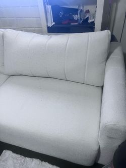 Beige big sofa bed.