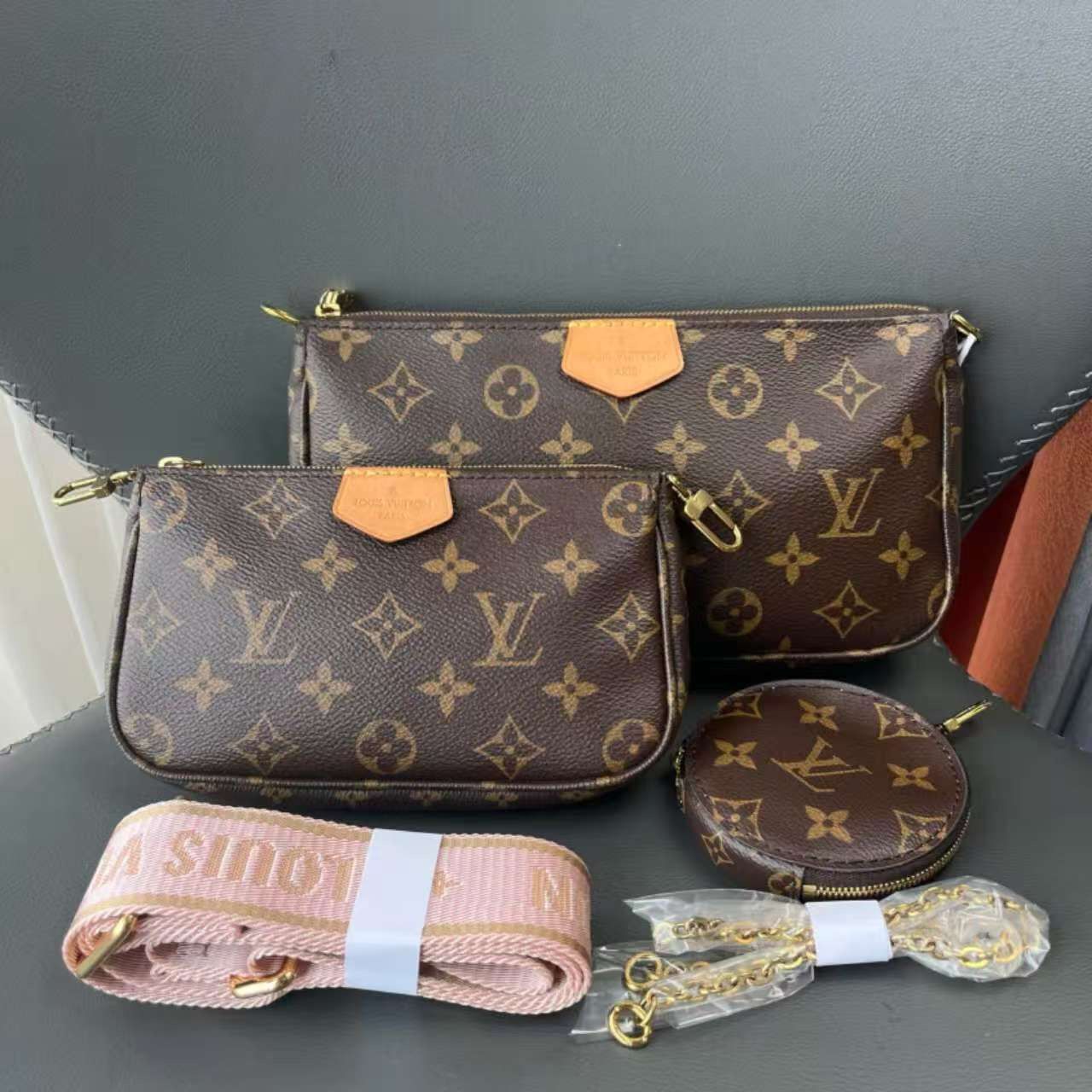 Louis Vuitton three-in-one bag