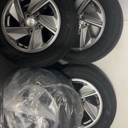 4 Brand new Tires with Rims