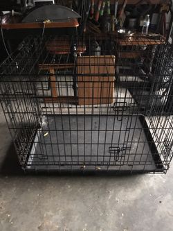 Dog cage with wheels